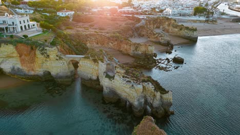 dramatic cliffs and coastline of portugal bathed in golden sunlight