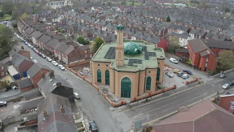 Aerial-view-of-Gilani-Noor-Mosque-in-Longton,-Stoke-on-Trent,-Staffordshire,-the-new-Mosque-being-built-for-the-growing-muslim-community-to-worship-and-congregate