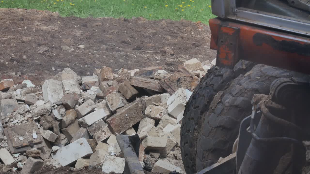 Excavator With Bucket Digs Construction Brick Scrap