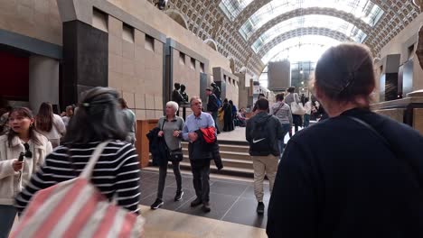 people exploring the orsay museum in paris