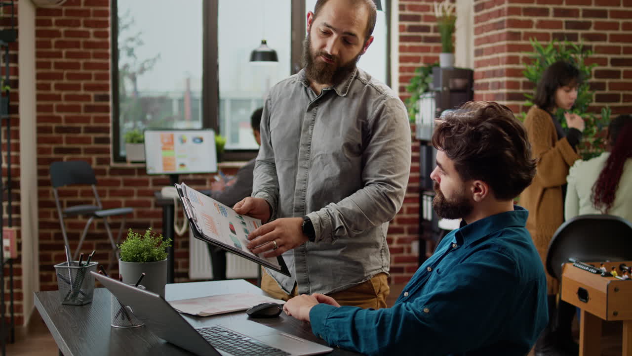 Business men brainstorming ideas to plan data report