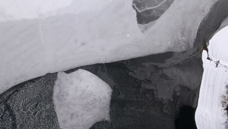 Top-down-view-of-a-frozen-Macedonian-lake-revealing-beautiful-ice-patterns