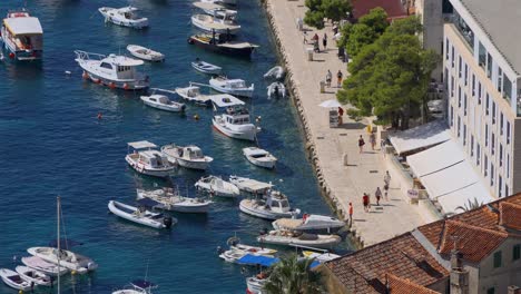 people walking along the riva in hvar croatia