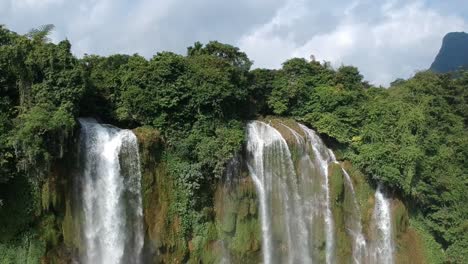 aerial view cascading waterfalls of ban gioc in vietnam. slow pedestal up