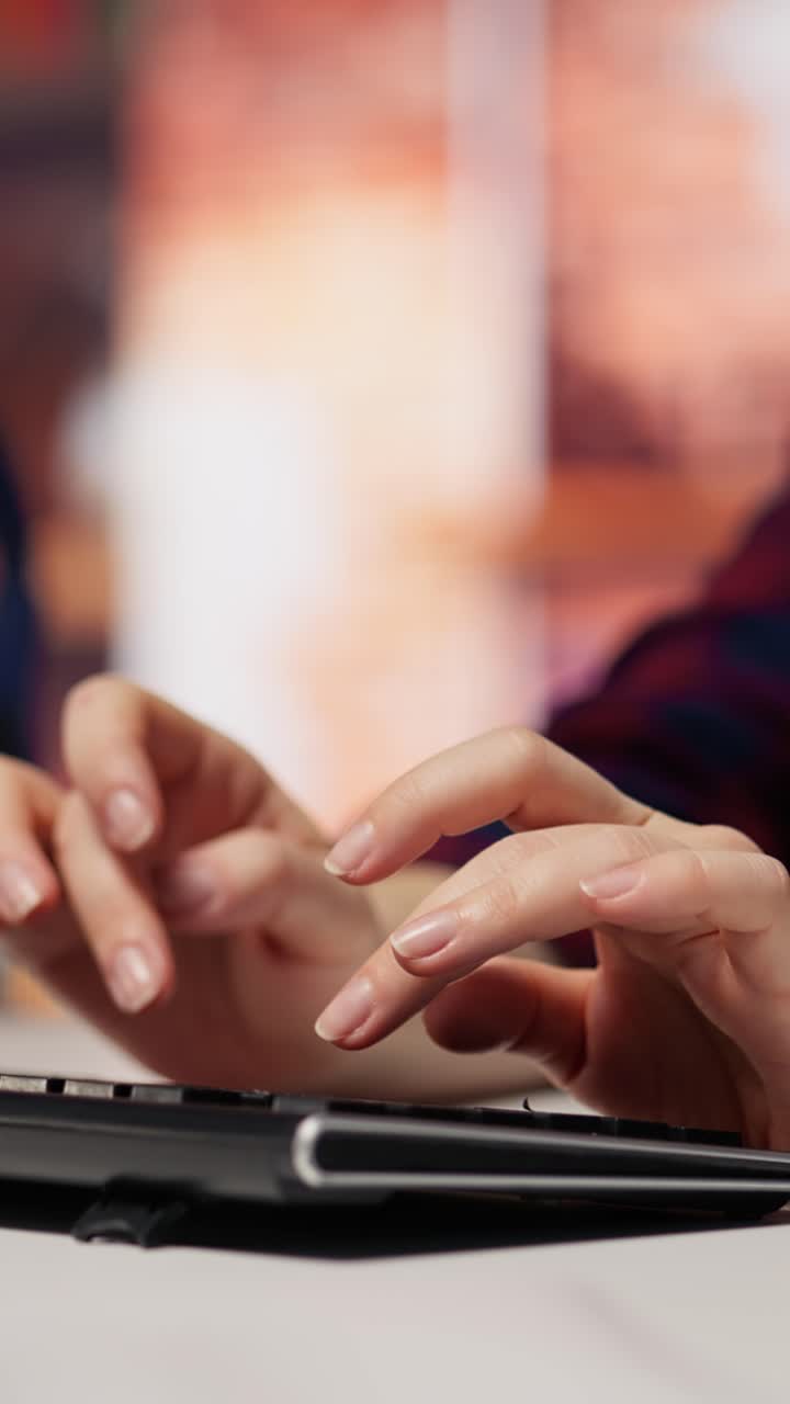 Vertical video Startup engineer conducting detailed code review to fix bugs