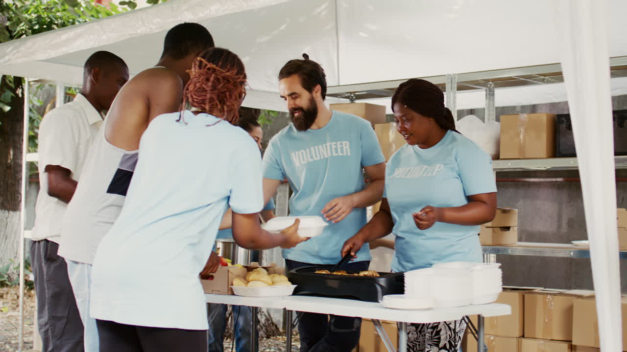 Man With Crutches Assisted By Woman