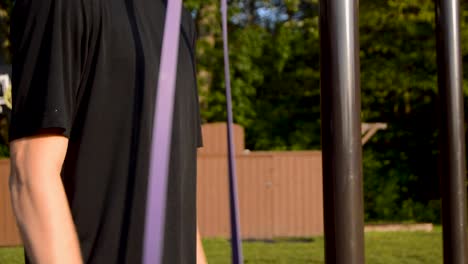 Young-White-Male-Exercising-with-Resistance-Band