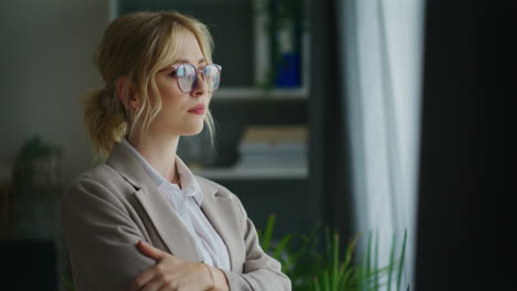 confident businesswoman looks into future with optimism