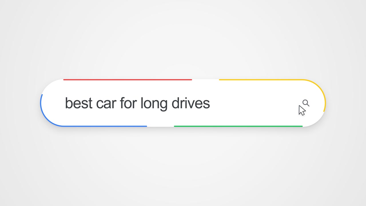 Close-up view of typing "best car for long drives" into an online search bar with a cursor clicking the search icon, illustrating internet search and automotive research