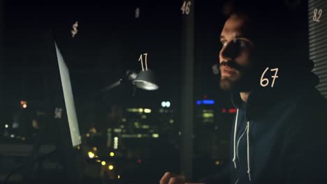 multiple numbers floating against caucasian male hacker using a laptop