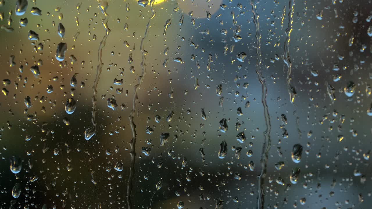 Raindrops On A Window On A Rainy Day