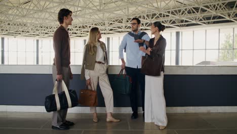 group of stylish people in conversation