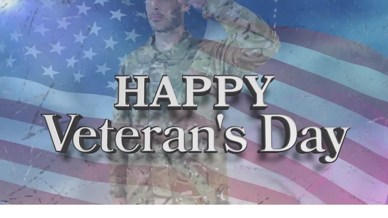 Happy veterans day text over caucasian soldier saluting against waving american flag