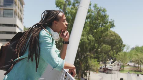 mixed race man talking on the phone