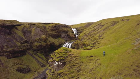 hiking to a waterfall in iceland
