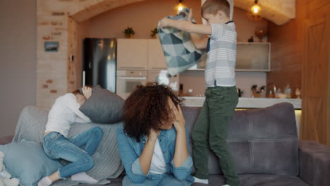 mom dealing with kids playing
