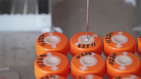 a closeup of the sterile medical lab machine performs the analysis automatically on detection of cancer by analysis of a puncture