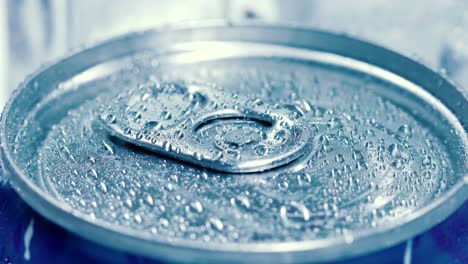 aluminum soda tin can lid cover of soft drink on ice goes around the circle.