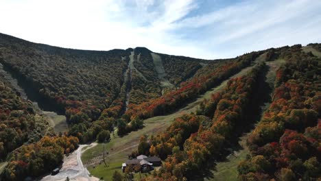 aerial drone shot of fall colors over killington ski resort in vermont