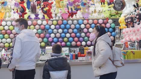 people playing a game at a carnival