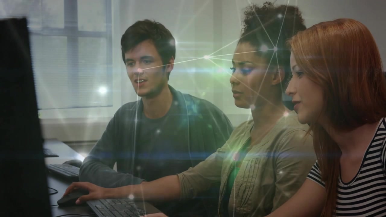 Diverse Group of Students Collaborating on Computer Project