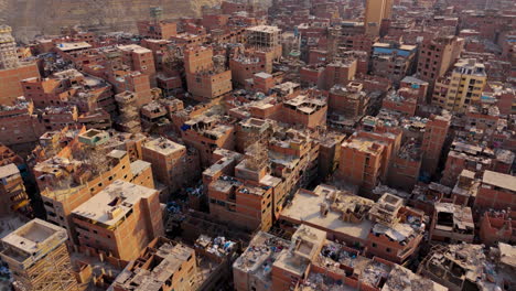 zabaleen area in cairo with piles of garbage - drone view
