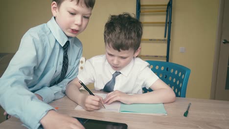 tracking slow motion pupils do homework write numbers in notebooks help each other 1