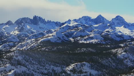 the minarets jagged peaks mountain range summit vista mammoth mountain ski resort california winter spring deep snow hemlocks ritter sierra nevadas sunny blue sky clouds snowy deep snow static