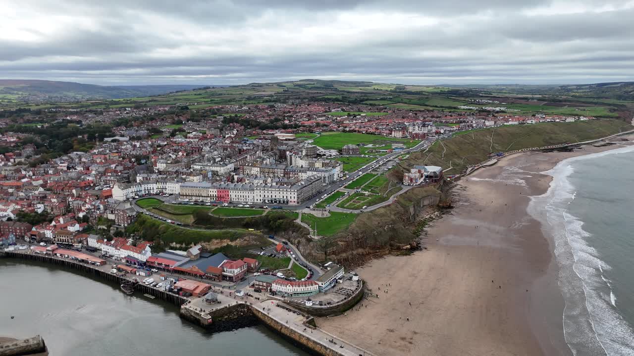 Aerial drone view Whitby Abbey north yorkshire british english seaside port harbour town city england uk