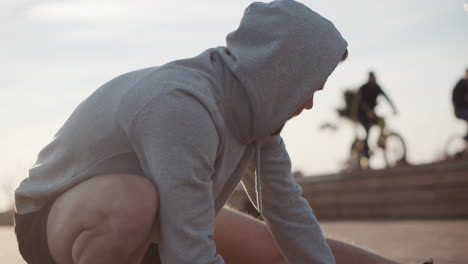 man stretching outdoors