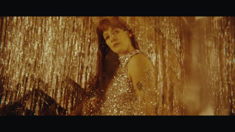 glamorous woman in a glittering dress