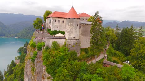 stunning drone footage of lake bled, slovenia, showcasing the iconic island, castle, and lush landscapes