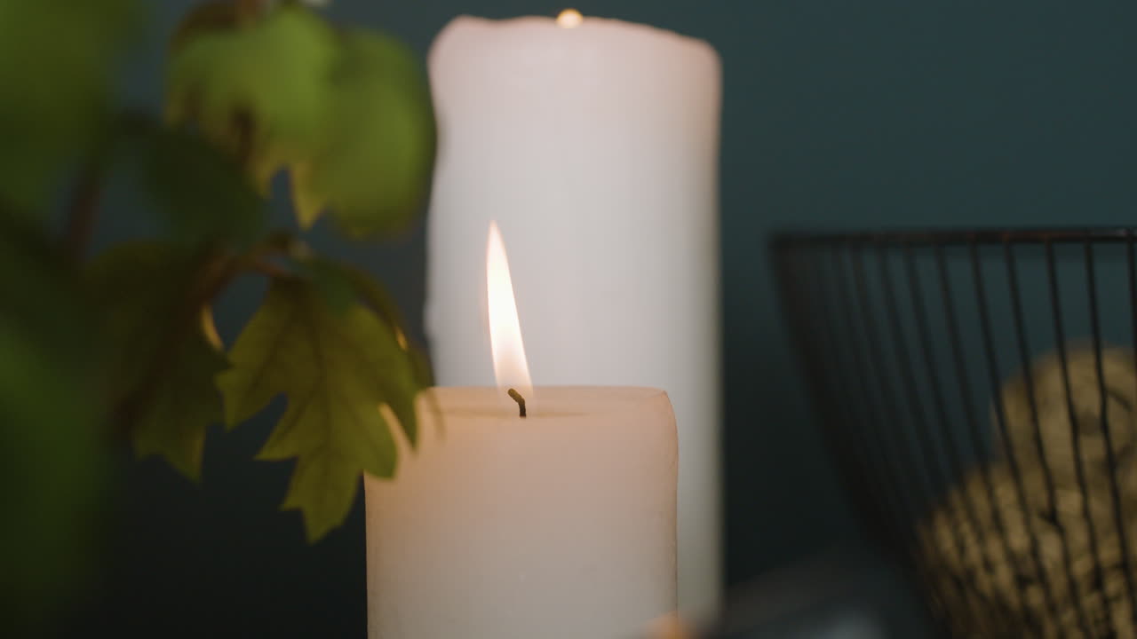 Candles and leaves still life