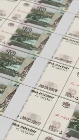 vertical video of 10 russian ruble banknotes printing by a money press