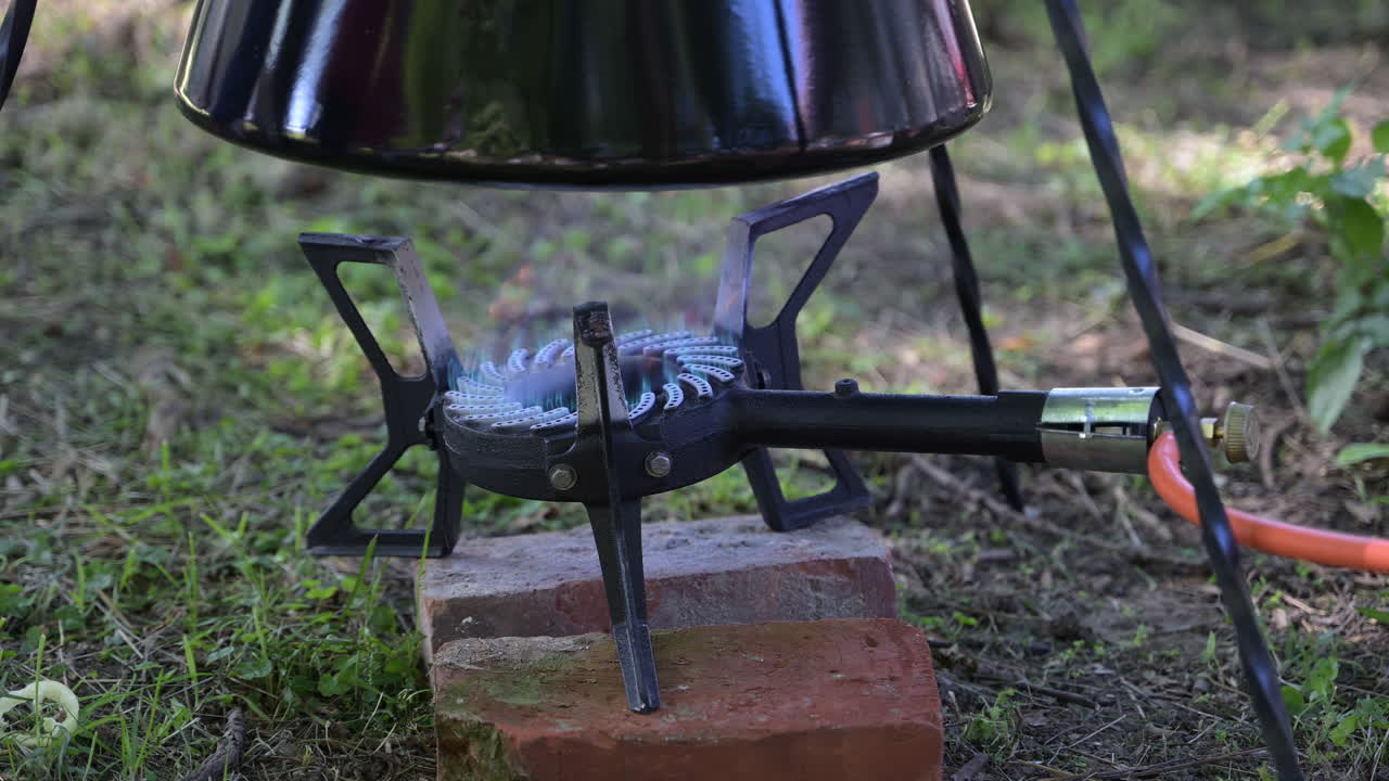 Gas burner with cooking pot outdoors