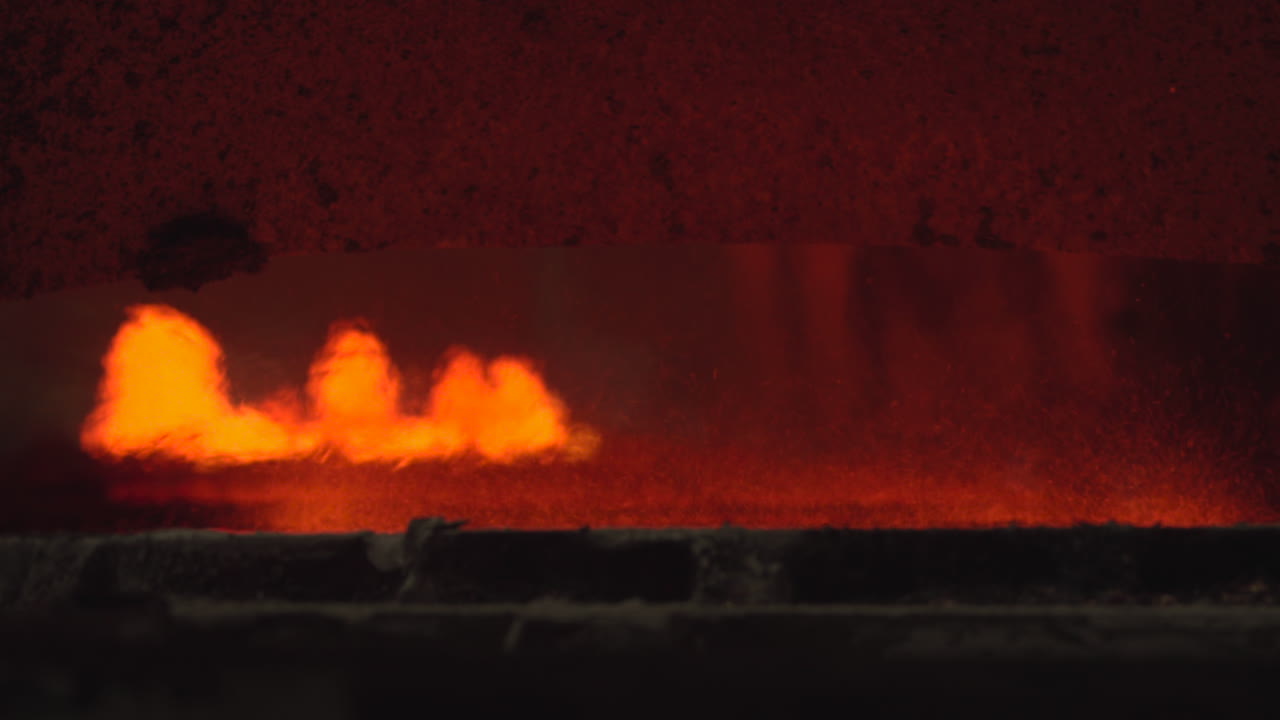 Intense Flames and Sparks Inside a Hot Industrial Furnace