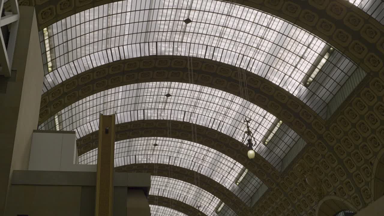 Beautiful interior of the Musée d'Orsay in Paris with an elegant glass ceiling