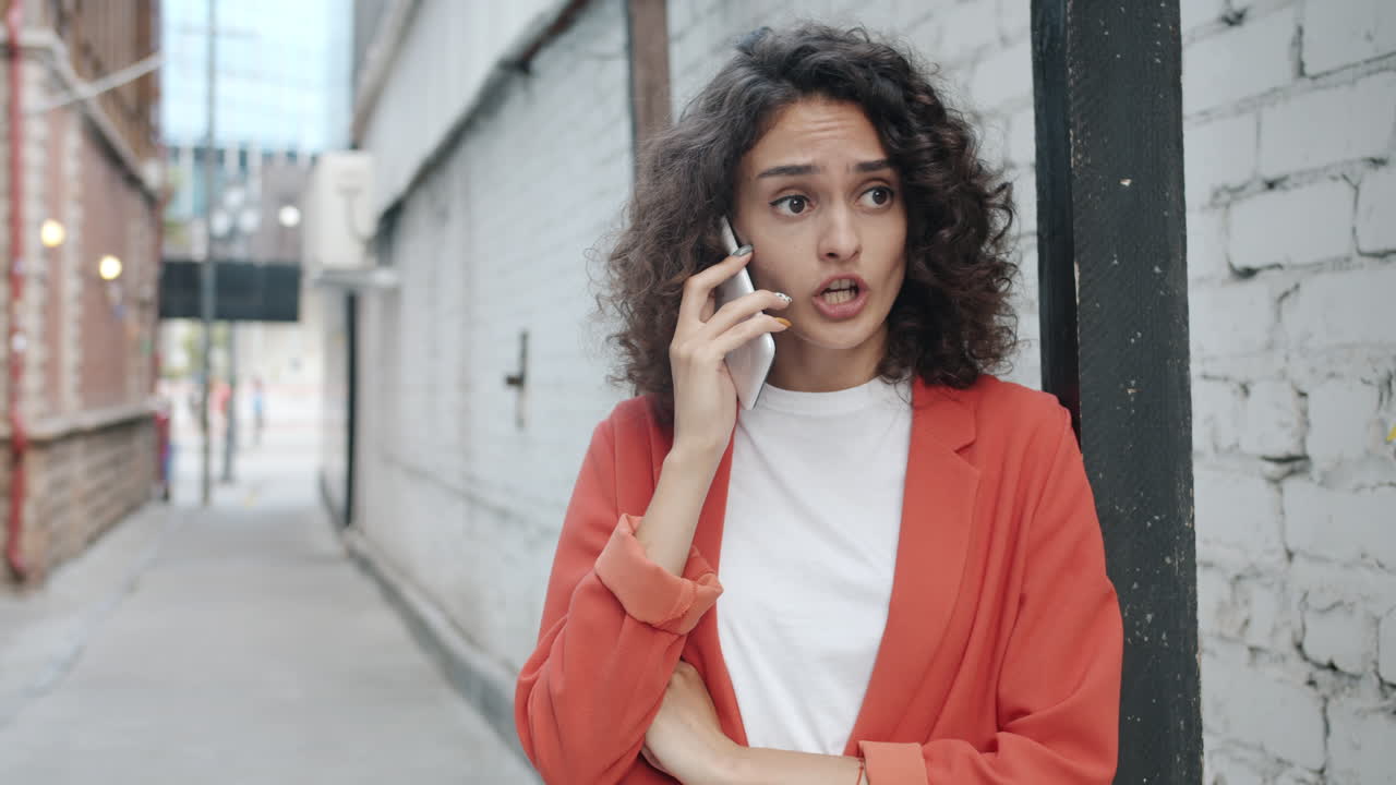 Woman on Phone in Alley