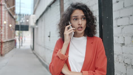 woman on phone in alley