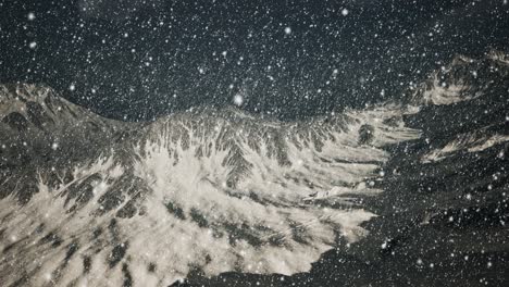 Heavy-snowing,-focused-on-the-snowflakes,-mountains-in-the-background