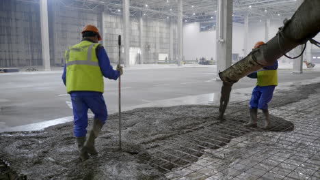 concrete pouring in a large industrial building