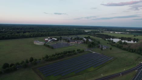 An-aerial-shot-of-solar-panel-is-installed-beside-the-asphalt-road-to-use-solar-energy-to-be-street-light