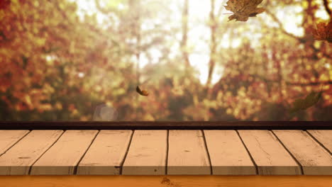 tabla de madera contra las hojas de otoño 4k