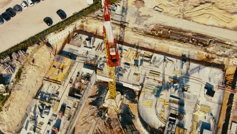 Aerial-Flight-Over-a-New-Constructions-Development-Site-with-High-Tower-Cranes-Building-Real-Estate