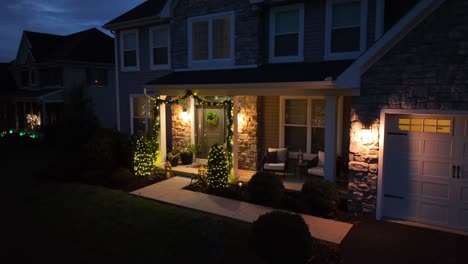 christmas lights and pine trees decorating home for holiday season