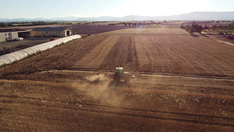 harvester cutting wheat agriculture aerial view