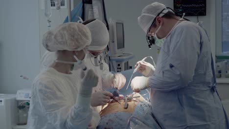 medical staff of the operating unit do heart surgery