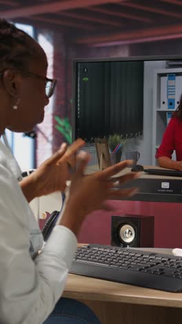 vertical video remote employee in teleconference meeting with manager, answering inquiries
