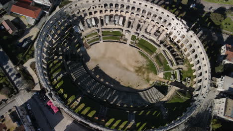 drone spinning over roman arena in pula, croatia, amphitheater