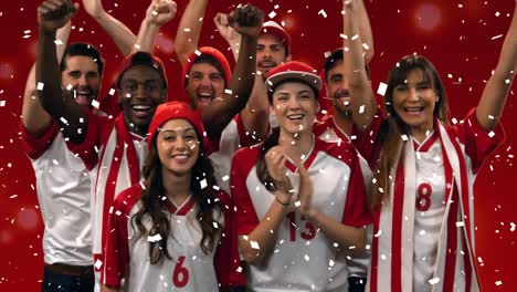 Group-of-fans-cheering-for-their-team-with-confetti